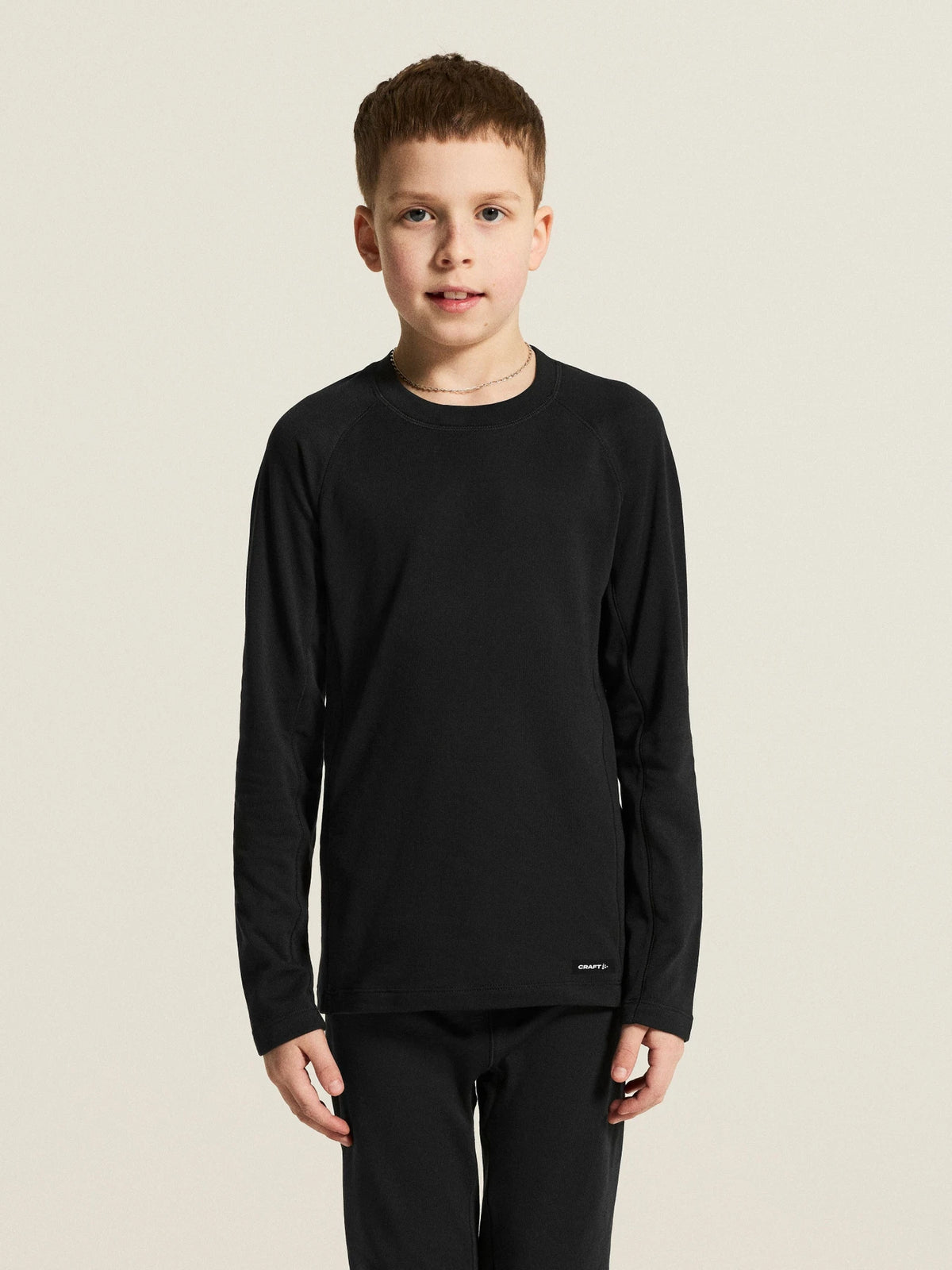 Zwart | detail | Shirt van voren, dichtbij, zwart – Craft thermoset kinderen shirt en broek - Thermal Baselayer