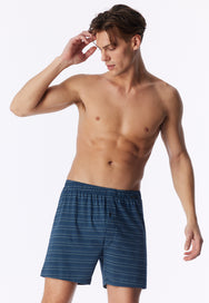 Blauw combi | voor | Vooraanzicht op model, blauw met dessin – Schiesser 2-pack wijde heren boxershorts met gulp - Blauw - Jersey