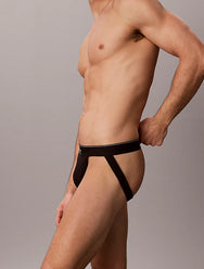 Zwart met gekleurd logo | zij | Zijaanzicht op model met open achterkant, zwart – Calvin Klein 3-Pack Jockstraps heren - Katoen - Zwart met logo