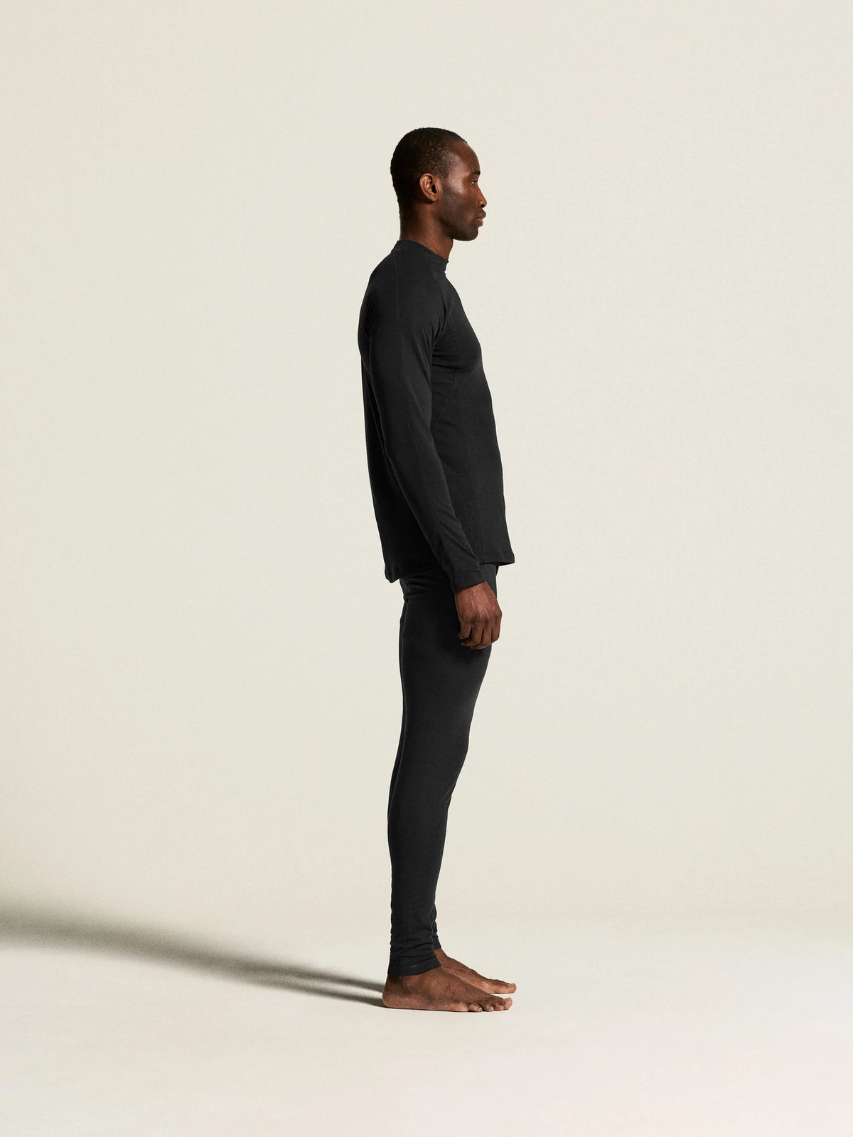Zwart | zij | Zijaanzicht op model, zwart – Craft thermobroek heren - Thermal Baselayer