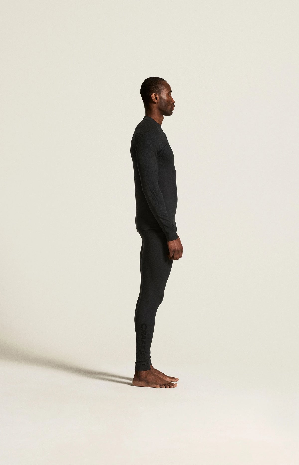 Zwart | zij | Zijaanzicht op model, zwart – Craft extra warme thermobroek heren - Warm Comfort