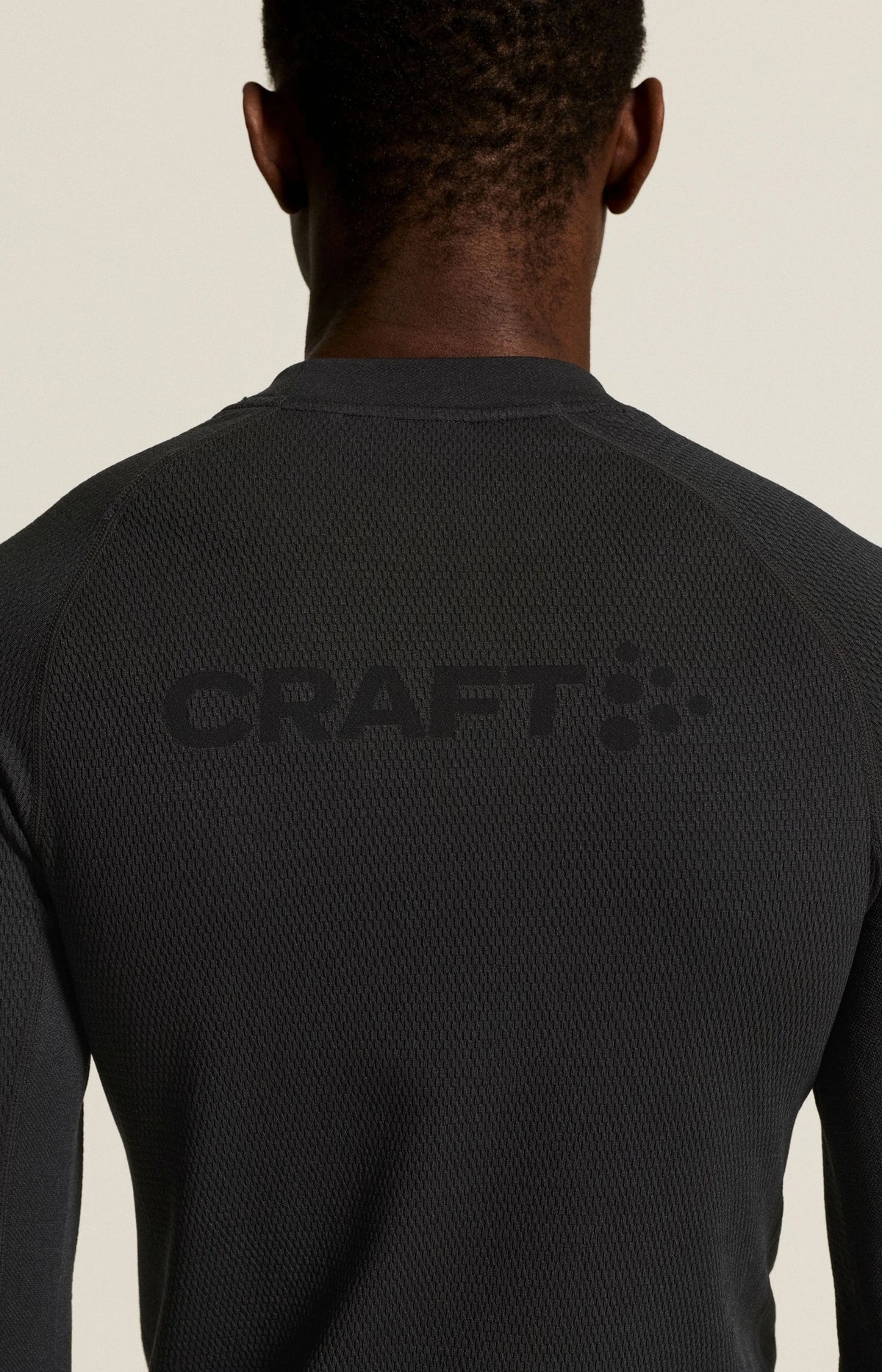 Zwart | achter | Achterkant met Craft-logo, zwart – Craft extra warm thermoshirt heren lange mouw - Warm Comfort