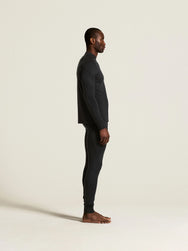 Zwart | zij | Zijaanzicht op model, zwart – Craft merino wollen thermoshirt heren lange mouw - Wool Comfort