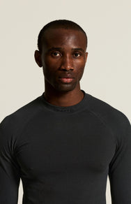 Zwart | detail | Detail hals en schouders, zwart – Craft extra warm thermoshirt heren lange mouw - Warm Comfort