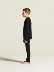 Zwart | zij | Zijaanzicht op model, zwart – Craft thermoshirt kinderen lange mouw - Thermal Baselayer JR